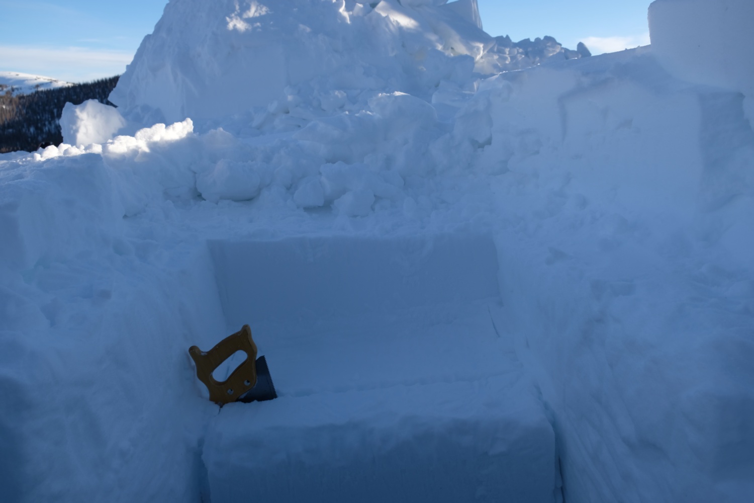 Starting to build a snow house.
