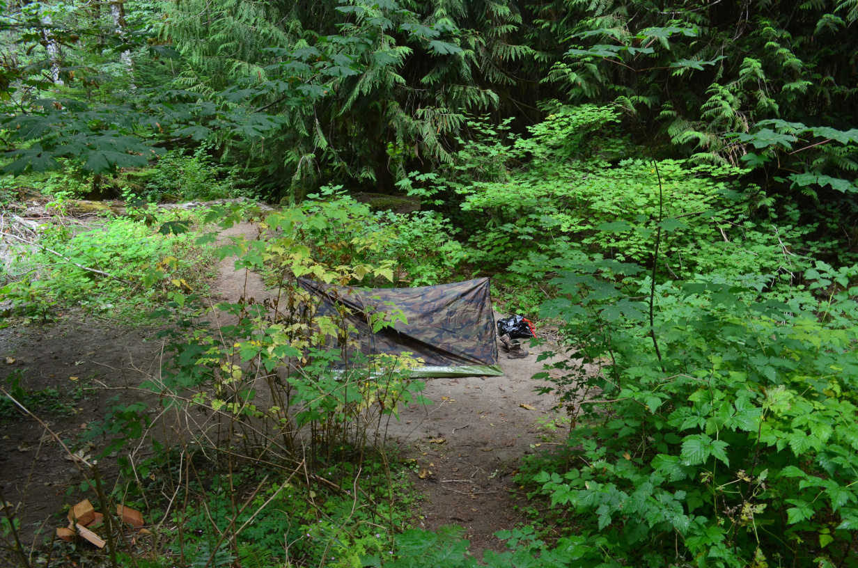 A new, cheap, camo a-frame tent.