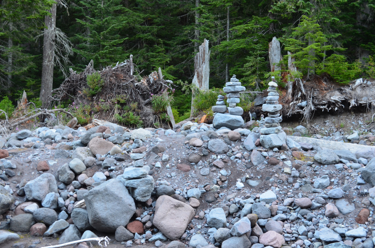 Cairns marking where the trial leaves the riverbed.