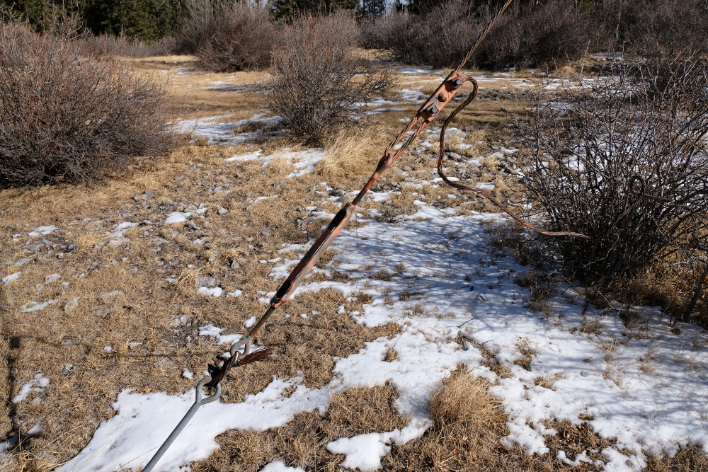 A turnbuckle on one of the guy wires.