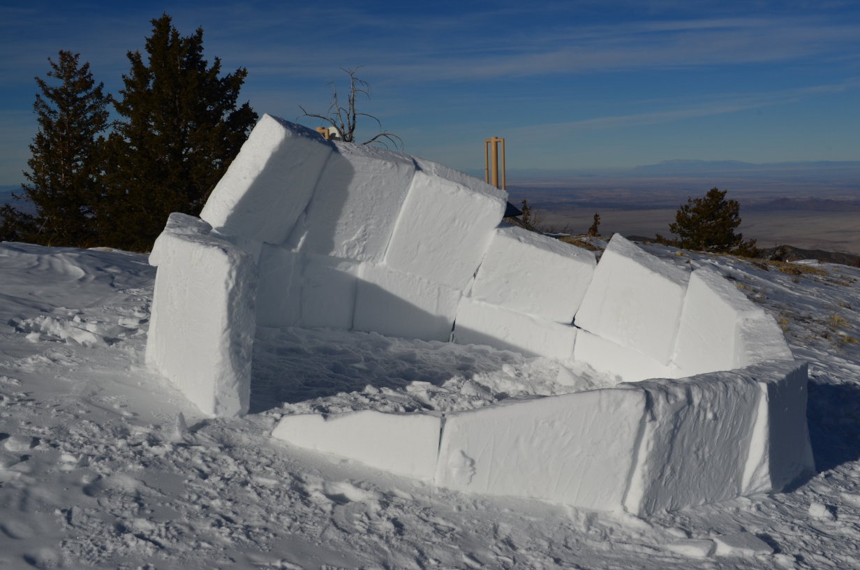 Starting a spiral of blocks to make the 2nd layer in the igloo.