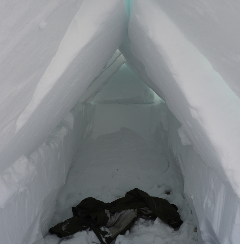 Inside the freshly build snow house.