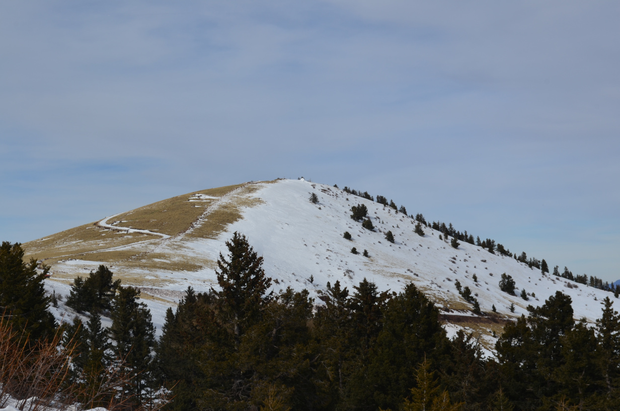 South Baldy with some snow and the igloo on top.