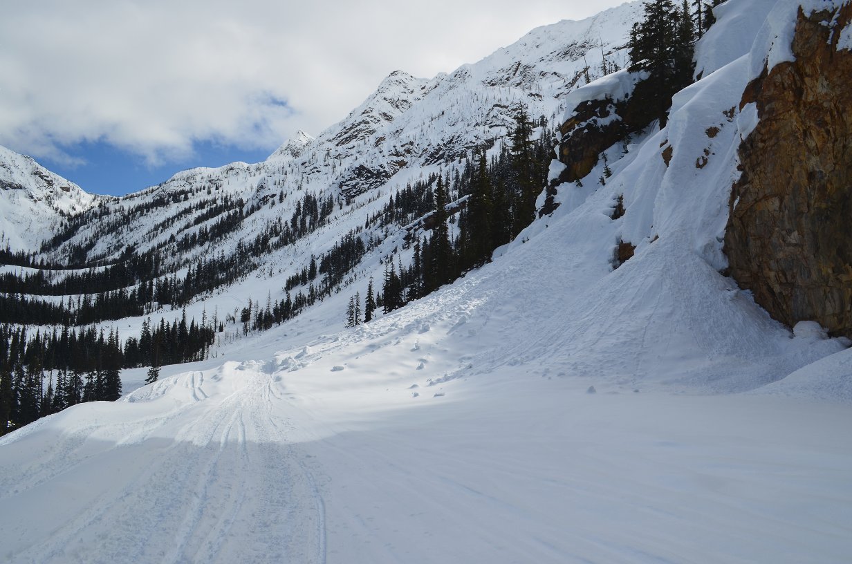 Snow piled on road by avalanches.