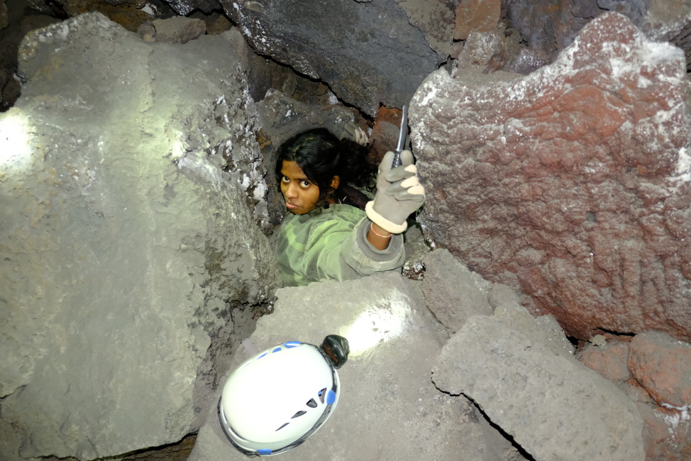 Eshani holding the plastic kids knife that she found.