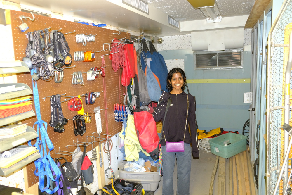 Eshani in the club storage area.