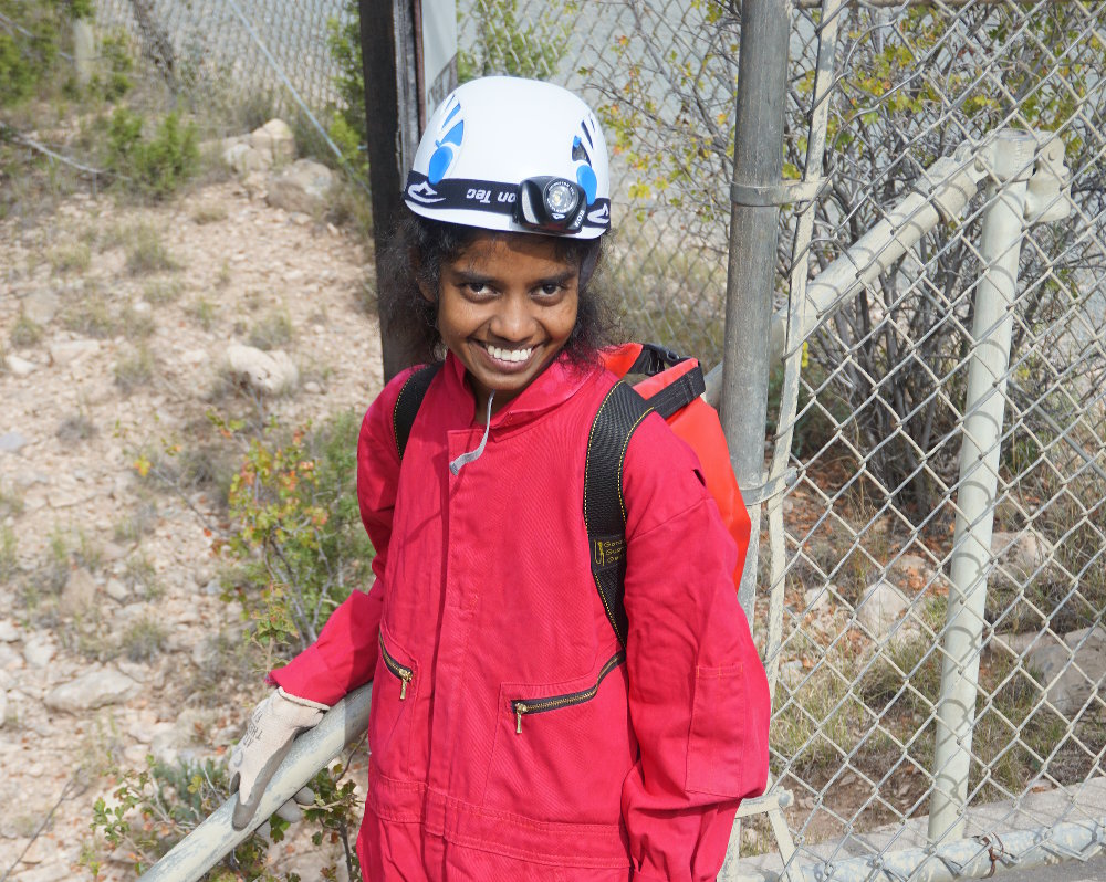 Eshani entering Fort Stanton Cave.