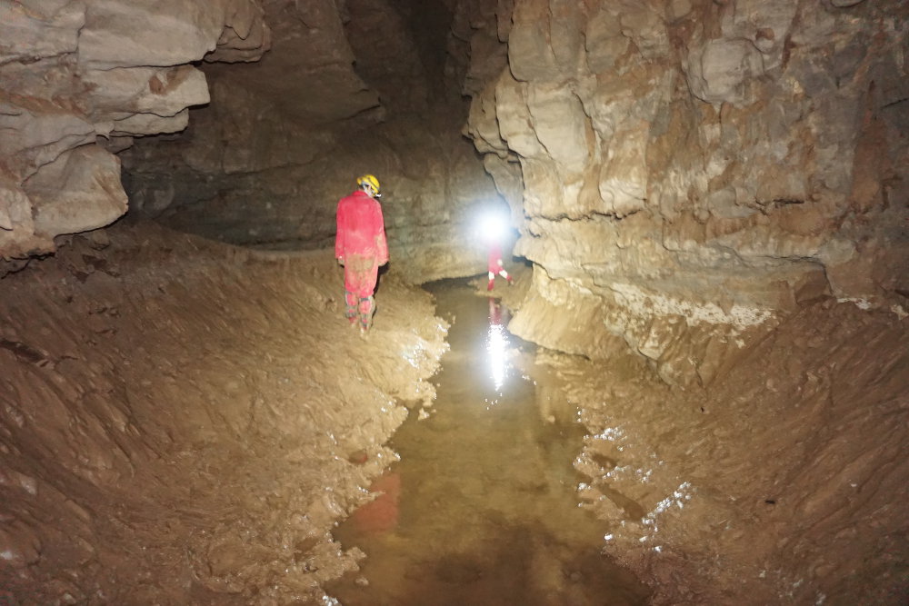 Cavers in the main passage.