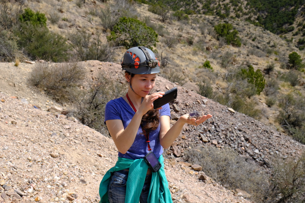 Searching the spoils pile for rocks.