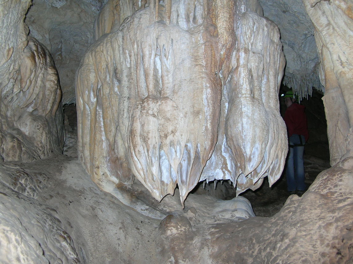 A large and roundish formation hanging from the ceiling.