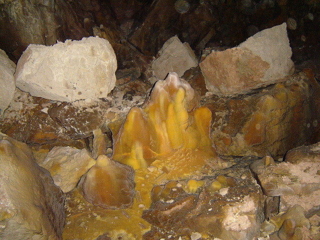 A formation surrounded by fallen boulders.