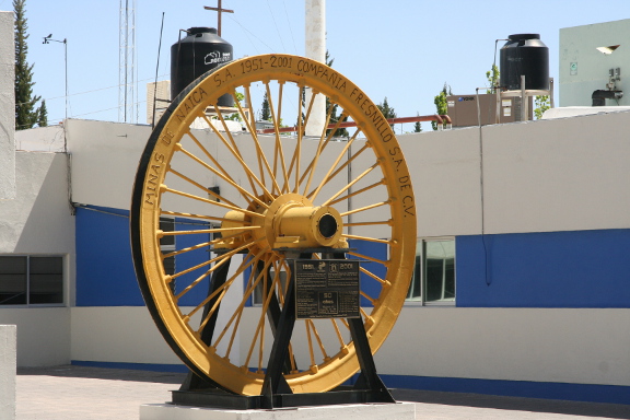 An old lift pulley setup as a monument.