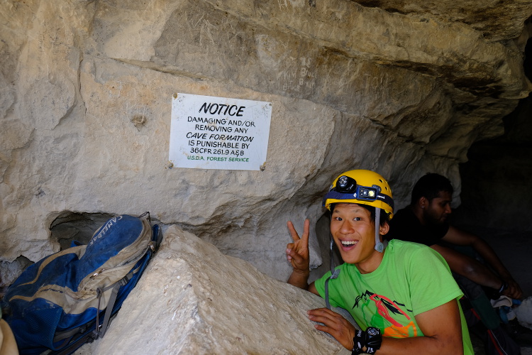 The don't damage the formations sign at the cave entry.